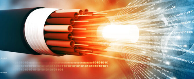 cross section of a fiber optic cable with 1 and 0 coming from the cable