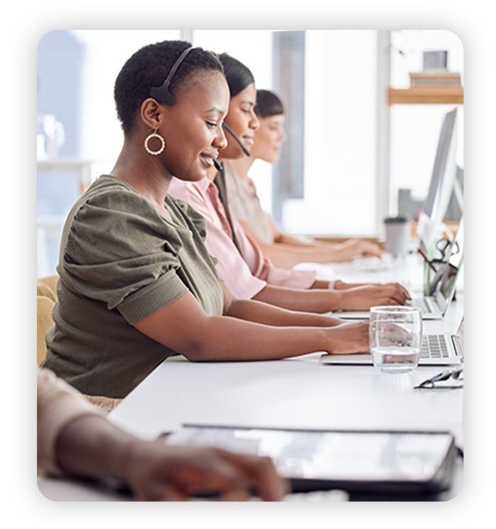 Group of friendly diverse customer service representatives work in modern office